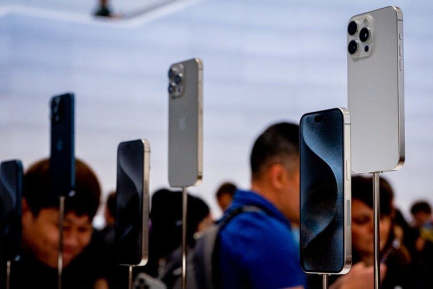 A photo of the iPhone 15 on a pole at the Apple Event